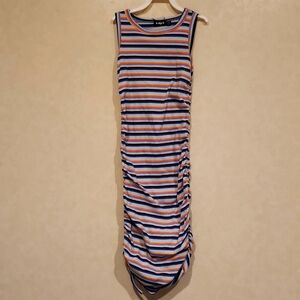 Kidpik brand dress size 7/8 girls. Scrunched sides. See pictures for details.